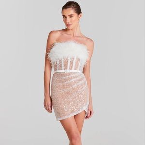 Mini white dress perfect for a wedding reception, or wedding related event.